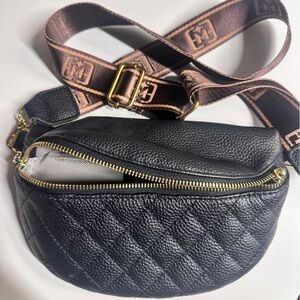 Elegant Black Quilted Bag with Brown Strap